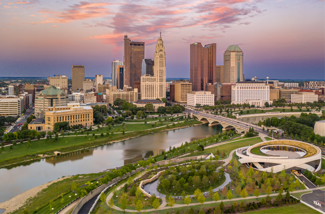 Sunset over Columbus Ohio city skyline and Scioto River By: mikespixels