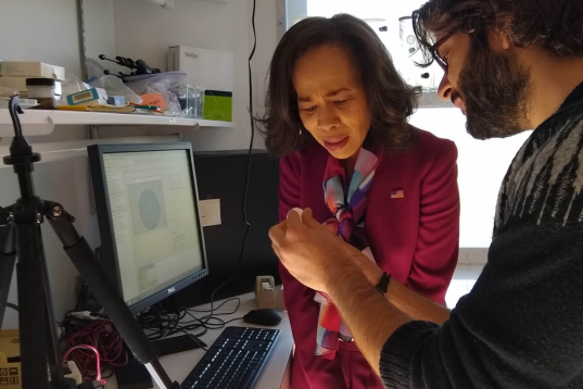 man showing  woman bug